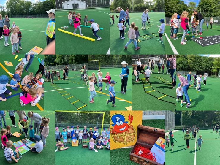 Kinder nehmen an verschiedenen Spielen und Aktivitäten auf einem Sportplatz mit Kunstrasen teil.