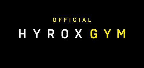 Logo von HYROX GYM mit schwarzem Hintergrund, gelben und weißen Buchstaben, betont "OFFICIAL" und "GYM".